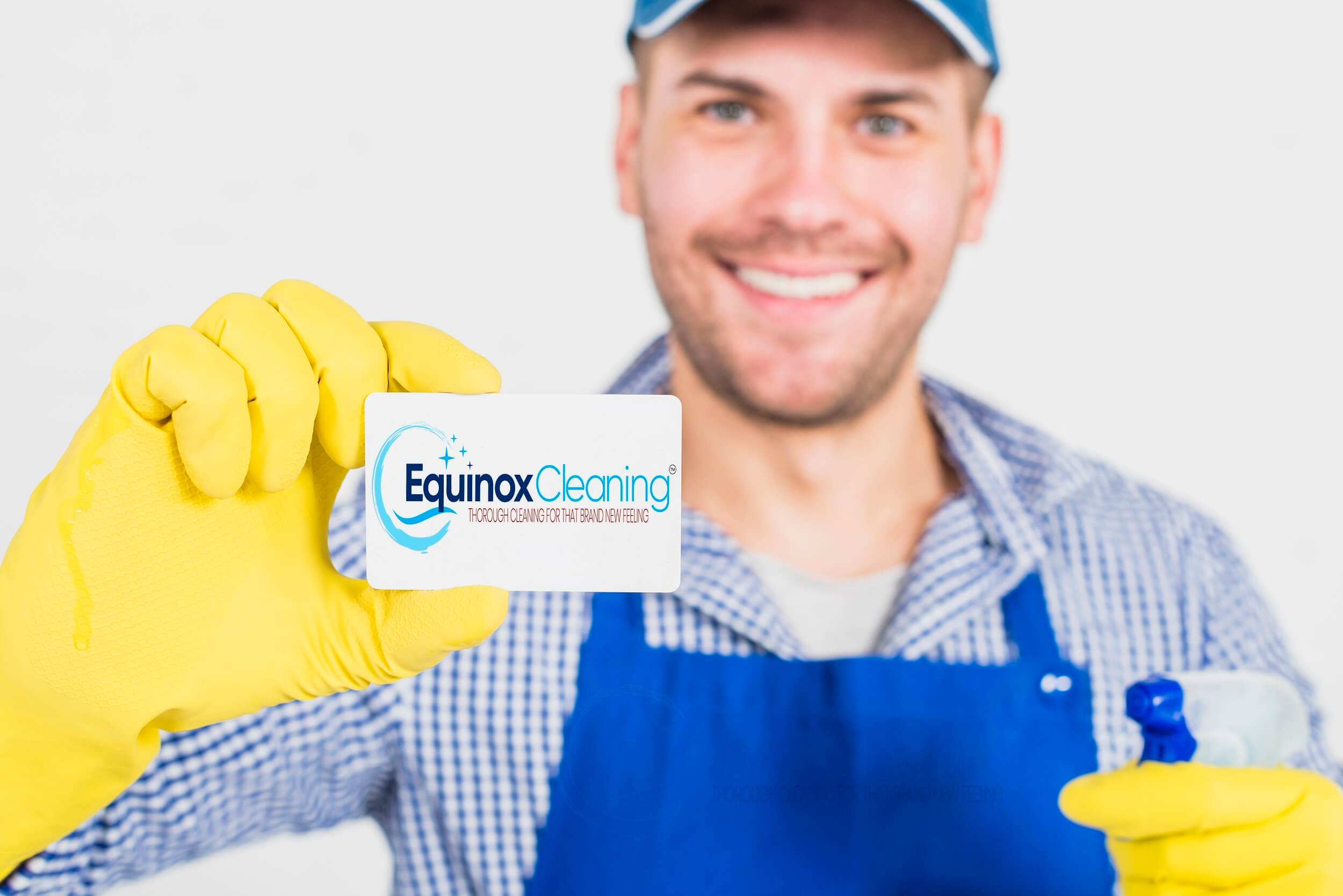 cleaning concept with man showing business card